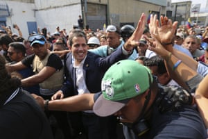 Juan Guaido greets supporters