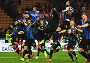 Internazionale players celebrate at the end of their derby win.