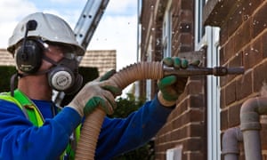 Cavity wall insulation is being installed in a home