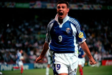 Savo Milosevic celebrates after scoring the equaliser for Yugoslavia in the 3-3 draw with Slovenia.