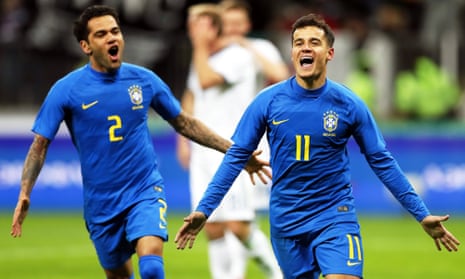 Philippe Coutinho (right) and Dani Alves celebrate after Coutinho put Brazil 2-0 up from the penalty spot at the Luzhniki Stadium in Moscow. 