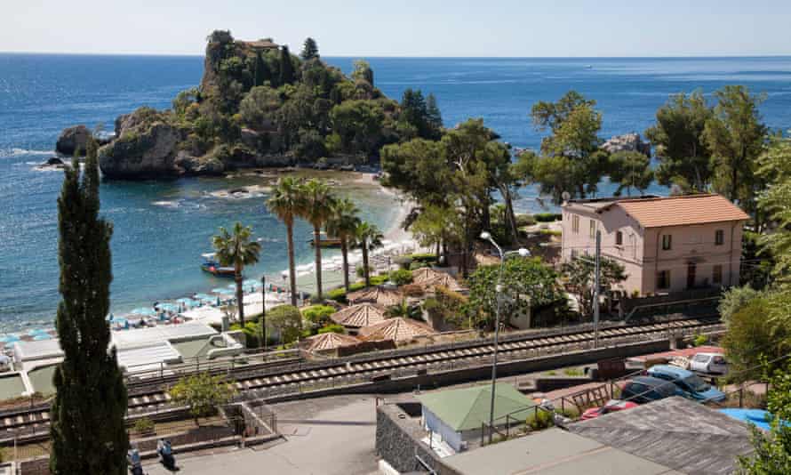 Taormina railway line with Isola Bella in the background, Sicily.
