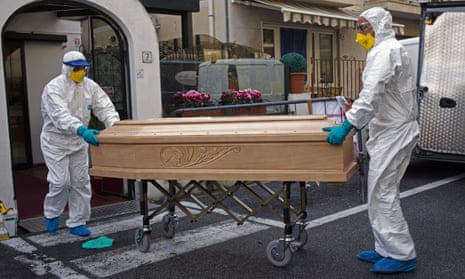 Medical staff with the coffin containing the body of Assunta Pastore