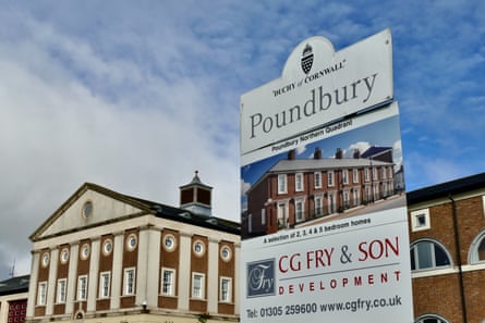 A sign advertising new homes in Poundbury.