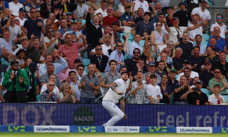 England's Ben Stokes takes a catch to dismiss Australia's Pat Cummins off the bowling of Joe Root.