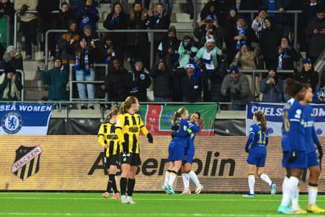 Erin Cuthbert (centre left) and Sam Kerr (centre right) celebrates goal in front of their fans.