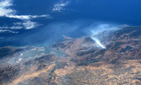 Zoomed out. This undated handout image courtesy of NASA and taken by astronaut Andrew Morgan aboard the International Space Station, shows smoke from the Kincade fire in Sonoma county, northern California. San Francisco is to the left. The Kincade fire has damaged 120 square miles.