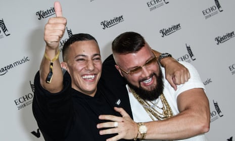 German rappers Farid Bang (left) Kollegah pose on the red carpet at the Echo 2018 music awards in Berlin.