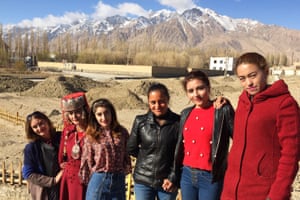 Tajik women who are optimistic about the regionâ€™s redevelopment.