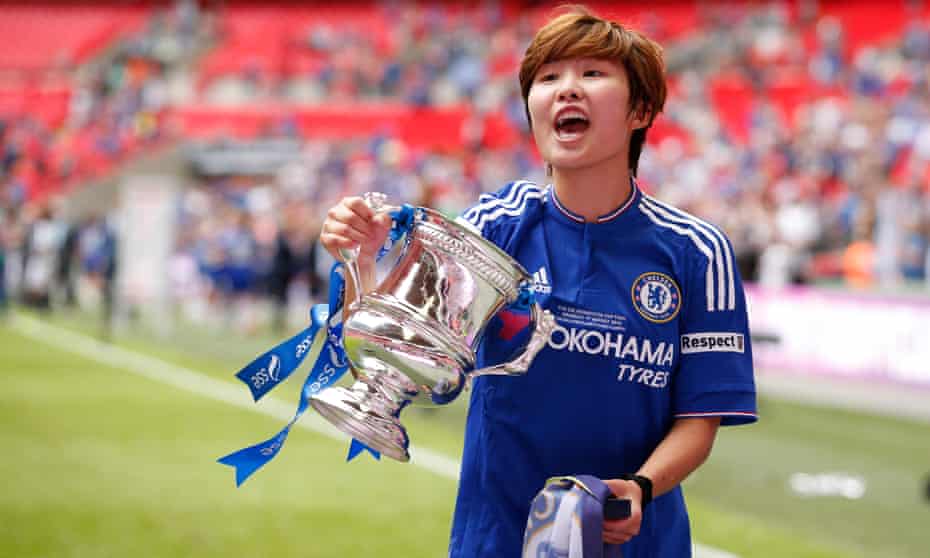 Chelsea’s goalscorer Ji So-yun celebrates with the FA Cup trophy.