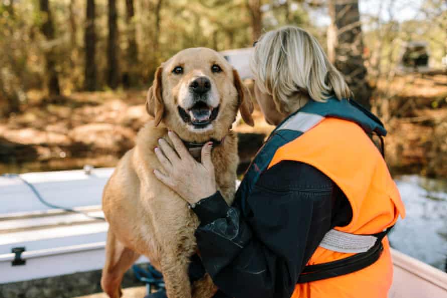 Ann Dugas and her nine-year-old dog Sundance after a water search exercise.