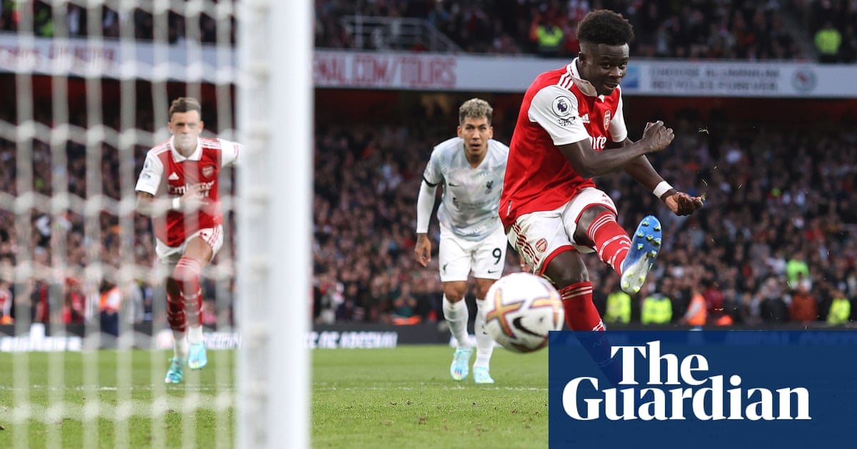 Bukayo Saka double sends Arsenal top after win over Liverpool in fiery clash – The Guardian