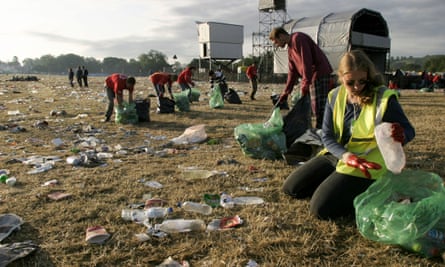 Volunteers collecting rubbish from Glastonbury’s Pyramid Stage field.