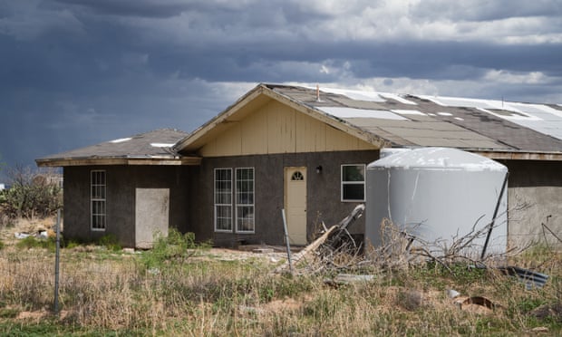 A home in Cochran colonia. To the right, a non-potable water storage tank. Almost every family has a unique method of storing the water they pay to have delivered by truck to their homes, when they can afford to. The most common storage is an above-ground steel container.