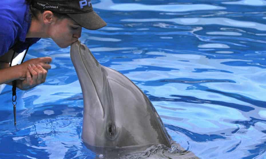 Abby Stone kisses Winter during a 2011 training session. 