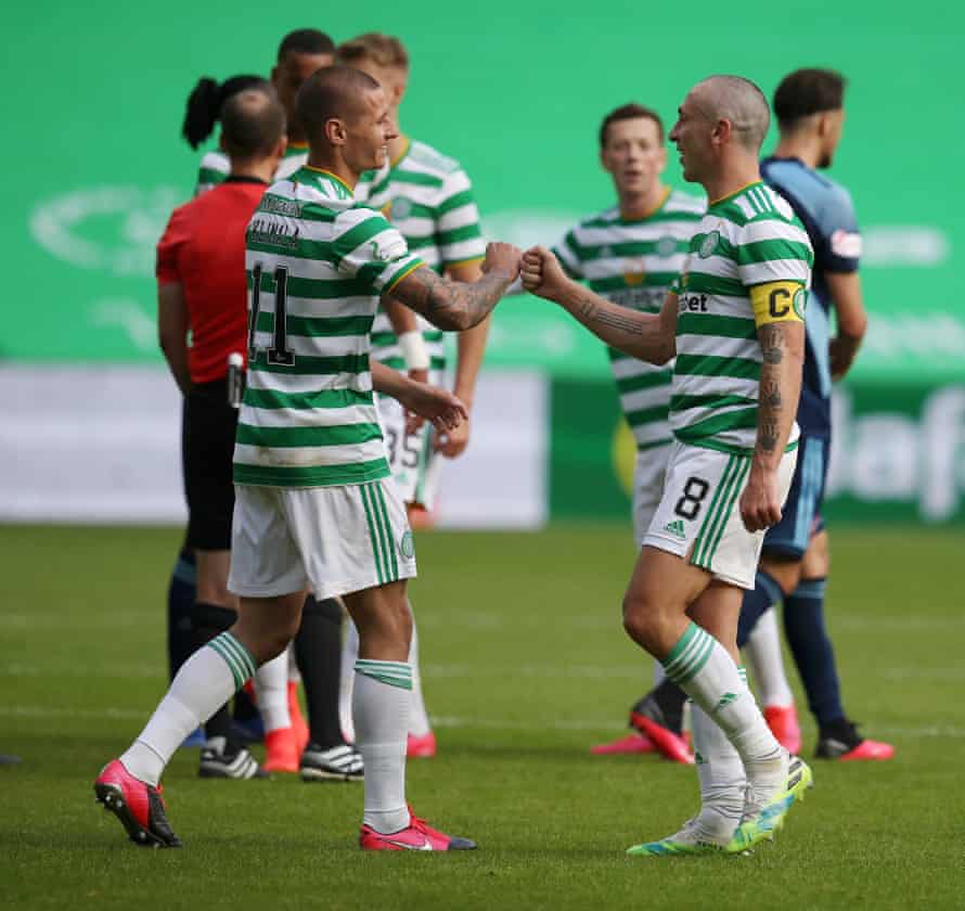 Patryk Klimala celebrates with Scott Brown after Celtic win 5-1.