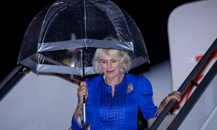 Queen Camilla steps off the royal plane.