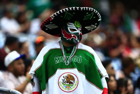 A Mexico fan wears an elaborate costume.