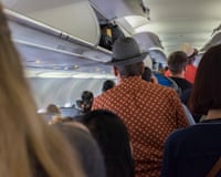 Passengers disembarking aircraft on arrival