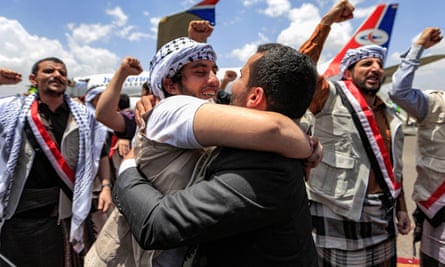 A man embraces a Houthi prisoner exchanged in a deal with Yemen’s internationally recognised government in April.