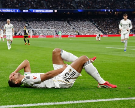 Jude Bellingham holds his hamstring