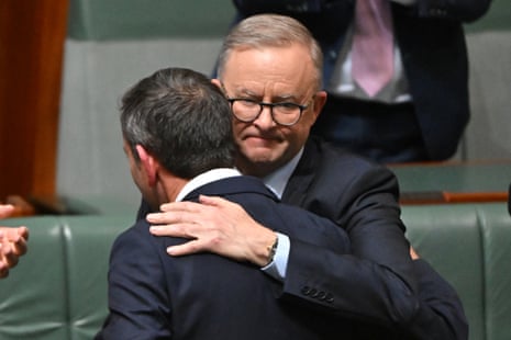 Anthony Albanese embraces Jim Chalmers after the treasurer delivered the Albanese government's first budget last night.