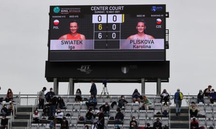 The scoreboard reads 6-0, 6-0 after Iga Swiatek beats Karolina Pliskova in the 2021 women’s Italian Open final