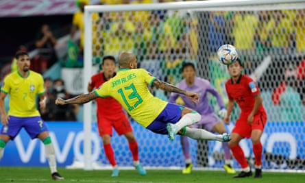 Brazil’s Dani Alves tries an acrobatic shot in the second half.