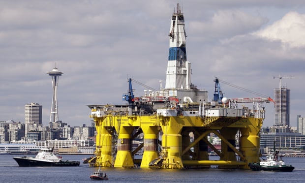 A Royal Dutch Shell oil rig – designed for Arctic oil exploration – is towed towards a dock in Elliott Bay, Seattle. 