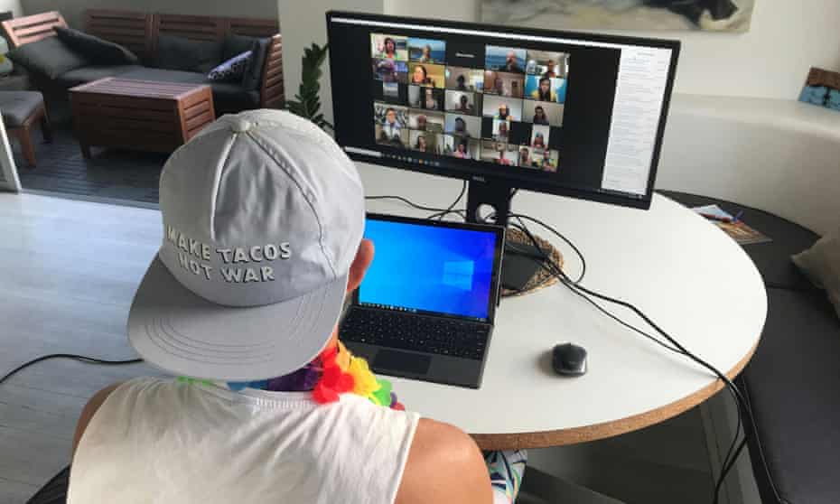 A man participates in a mental health group online chat. 