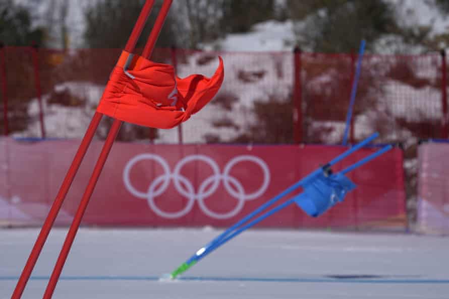 Gate flags bend in the wind after high winds.