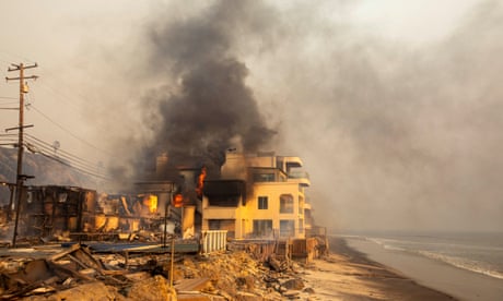 Palisades fire burns during a windstorm on the west side of Los Angeles.