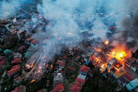 Smokes and fires in Thantlang, where hundreds of buildings have been destroyed by shelling from Junta military troops.