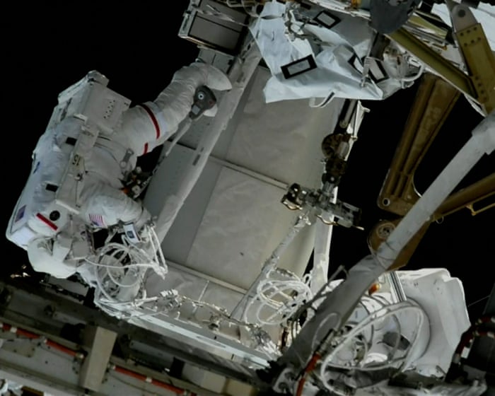 Nasa astronauts conduct spacewalk outside International Space Station – video — image supplied by The Guardian US's feed