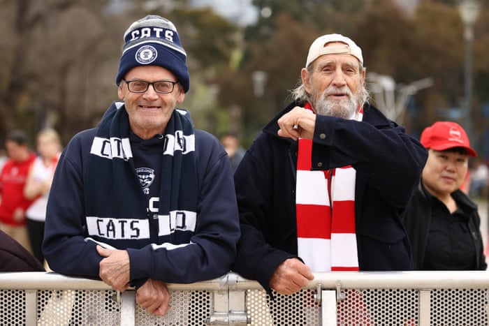Fans of Geelong and Sydney prepare for the AFL grand final.
