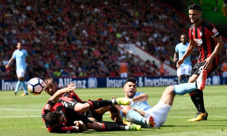 Manchester City’s Sergio Aguero goes down in the box.