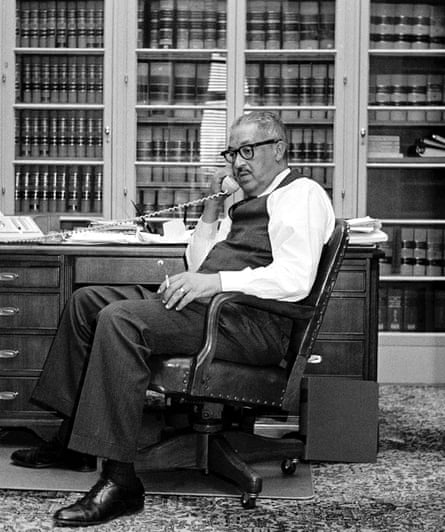 Now solicitor general of the United States, Marshall talks on the phone in his Department of Justice office in December 1965.