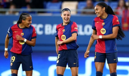 Barcelona’s Salma Paralluelo celebrates scoring their second goal against Wolfsburg in March with Vicky Lopez and Jana Fernández