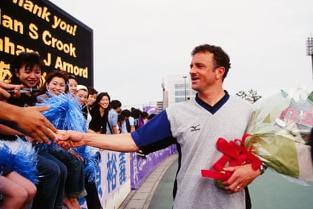 Graham Arnold shakes hands with fans after joining Northern Spirit in the J League.