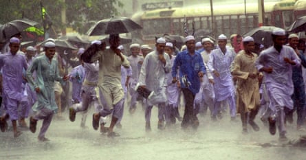 JAMAT PROTESTProtests in Gujarat in 2002 as a sudden rainstorm hits. Modi, minister of the state at the time, faced calls for his removal after over 1000 died in the violence.