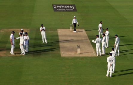 Zak Crawley is confronted by India’s players during the final over.