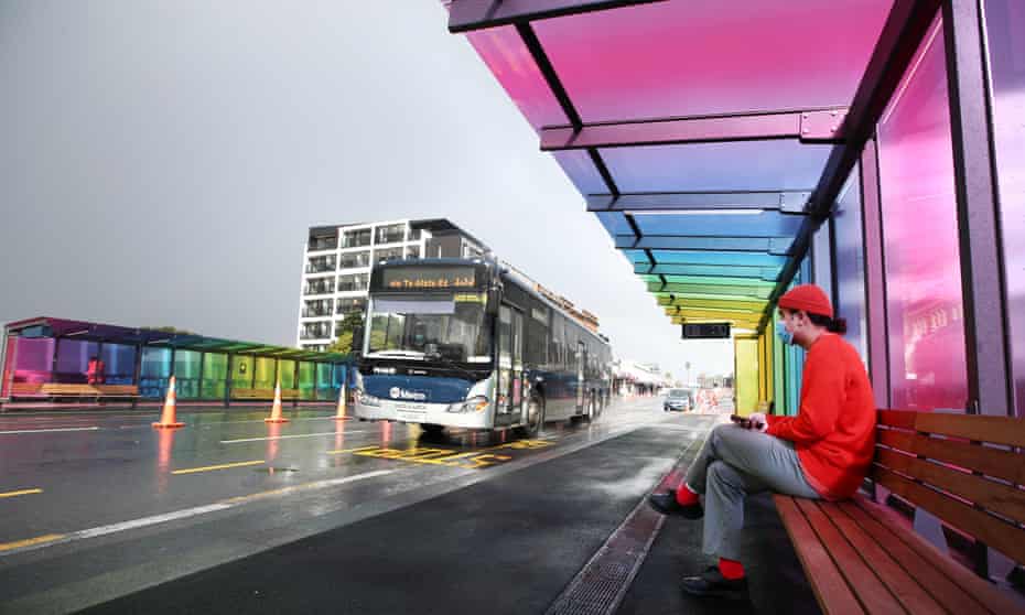 A person waits for a bus in Auckland, New Zealand. The country’s wealthiest 10% own nearly 60% of all assets. 