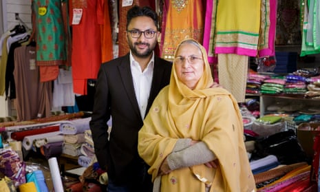 Writer Sathnam Sanghera with his mother Surjit in a fabric and fashion shop on Dudley Road in Wolverhampton.