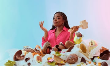 Benjamina Ebuehi sits with a wooden hammer surrounded by smashed Easter eggs