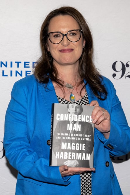 Maggie Haberman poses with her book in New York.
