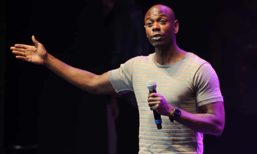 Dave Chappelle performing on stage
