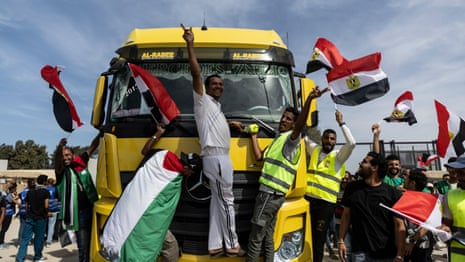 Aid trucks enter Gaza after Rafah border crossing opens – video