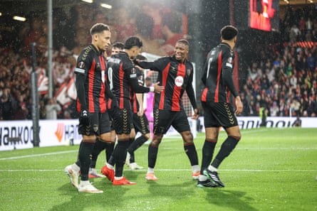 Bournemouth celebrate during their win against Milan