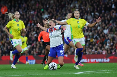 Brazil’s Angelina (right) fouls England’s Ella Toone, and was sent off shortly afterwards.