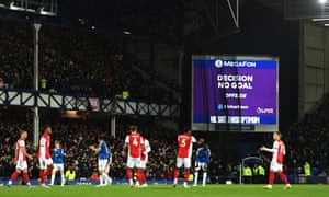 The big screen shows the VAR decision to disallow a second goal scored by Richarlison of Everton.